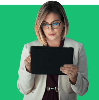 Woman wearing glasses and using a tablet