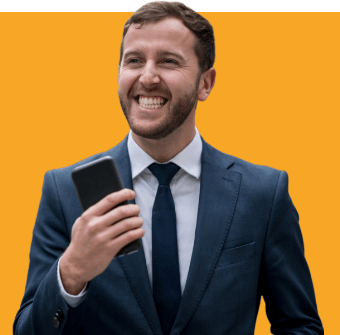 Man with a big smile holding a smart phone