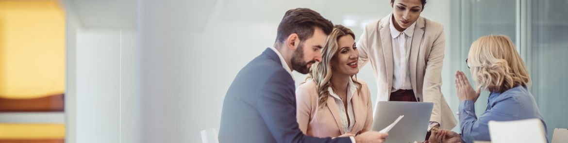 People smiling together having a meeting in the office