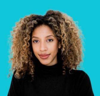 Smiling woman with blue background