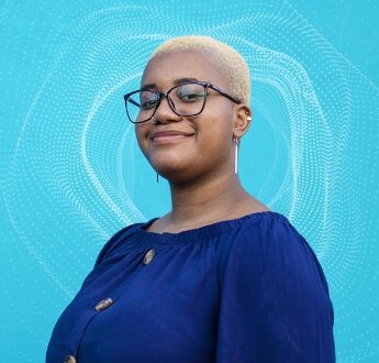 Smiling woman with blue abstract dot pattern background